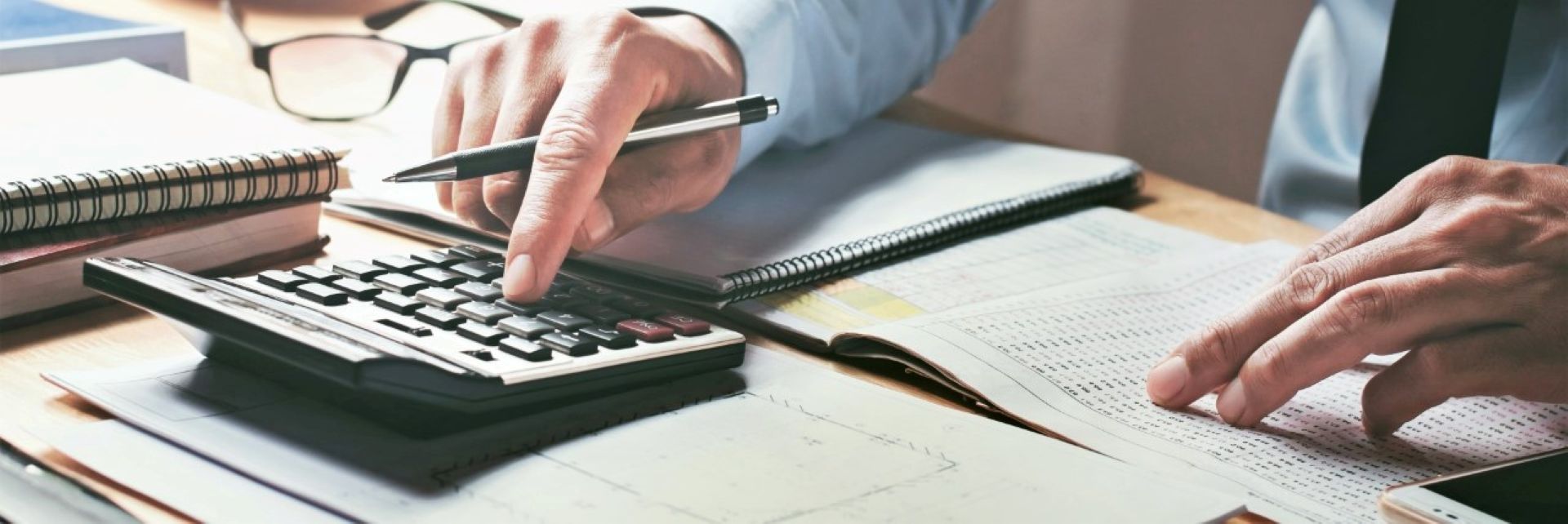 someone using a calculator